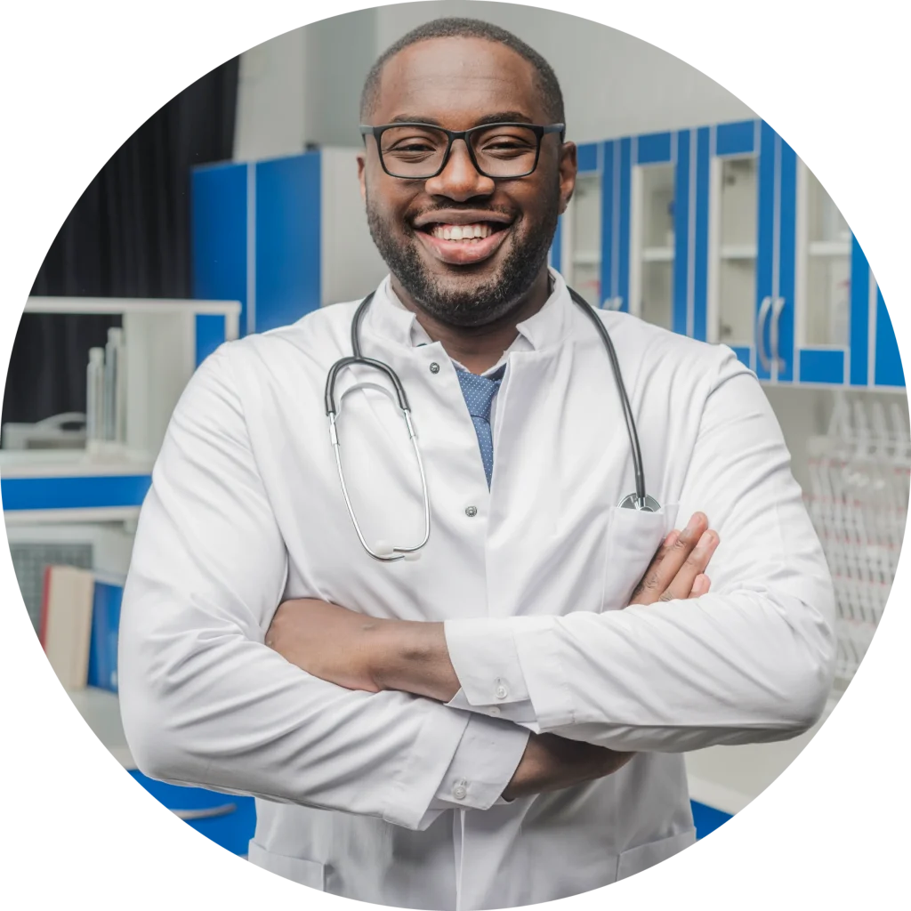 cheerful-ethnic-doctor-with-arms-crossed